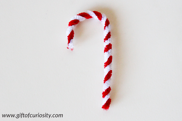 Beautiful crystallized candy canes make a great Christmas STEAM (science, technology, engineering, art, math) activity your kids will love!