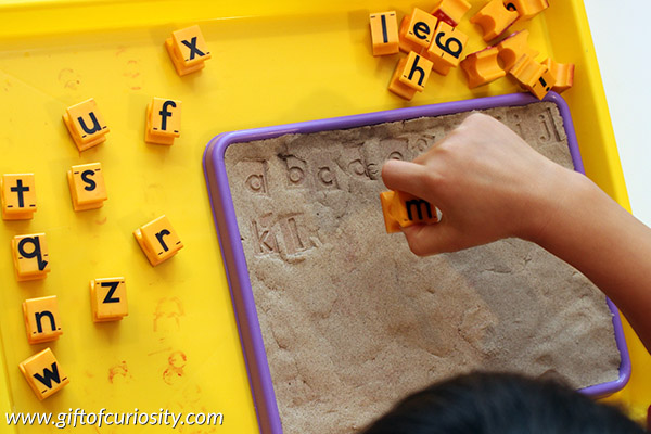 Learning to alphabetize using stamps and kinetic sand | teaching the alphabet | literacy skills kids need | alphabetization activities for kids || Gift of Curiosity