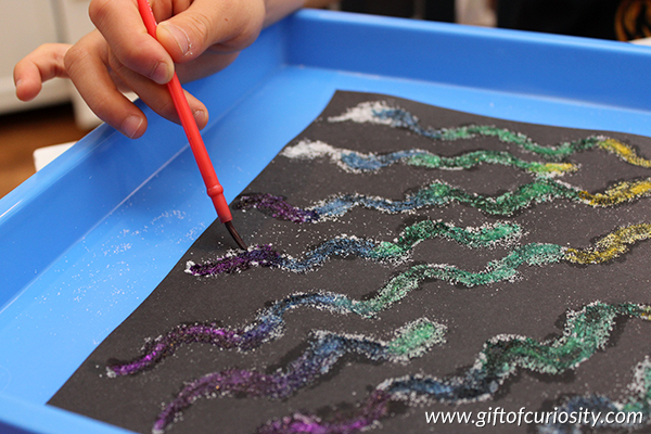 Salt & Glue Watercolor Paintings: This process art STEAM activity takes advantage of the water-absorbing power of table salt to make salt and glue “rivers” that allow watercolors to flow. #processart #artsandcrafts #STEAM #giftofcuriosity #preschool #kindergarten #tweens #handsonlearning #kbn#kbnmoms #kbnbloggers || Gift of Curiosity