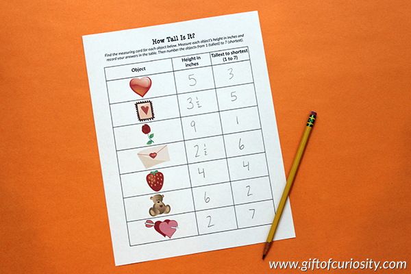This pack of 25+ themed measurement activities for children in grades 1-3 helps children practice measuring objects in either inches or centimeters. Plus, after recording their measurements on the included worksheet, children sort the objects by height. So many great math skills in one engaging activity! #giftofcuriosity #measurement #math #STEM #STEAM #printables #1stgrade #2ndgrade #3rdgrade || Gift of Curiosity
